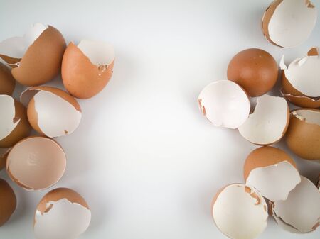 Waste eggs with a white backgroundの写真素材
