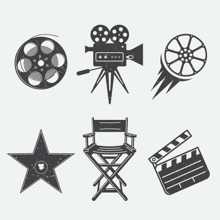 Different icons for movie and production in vintage style. Movie camera, star award, movie clapper, camera, bobbin, cine-film and director armchair.のイラスト素材