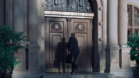 Poznan, Poland - a man entering the rector's office (rektorat) of Adam Mickiewicz Universityの写真素材