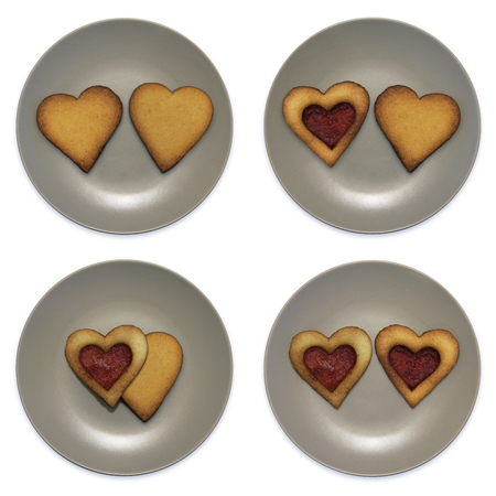 set of smiley in the form of plates with cookies, isolated on white backgroundの写真素材