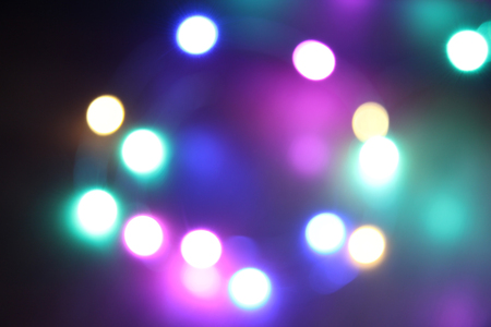 Abstract bokeh nigth background. Colorful magic lights background, decoration for the party. Neon...