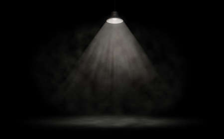 The dark stage is illuminated by a spotlight. White smoke. Background. Bright beams of a spotlight....