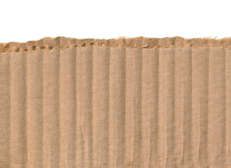 Torn piece of cardboard, background for banner. Blank paper piece message, reminder, sign, tag, label, ad. Corrugated ripped cardboard empty background. Design element. Isolated on white. Copy spaceの写真素材