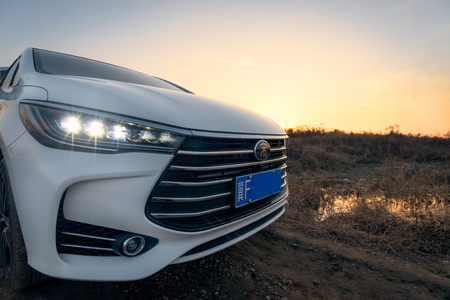 Modern white car on off roadのeditorial素材