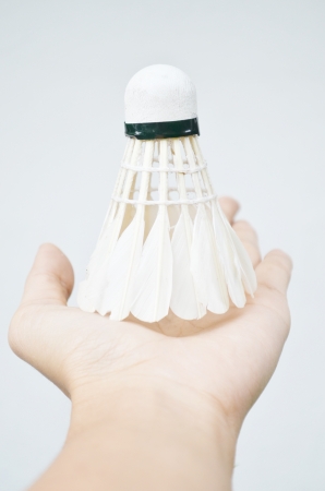 Shuttlecock on handの写真素材