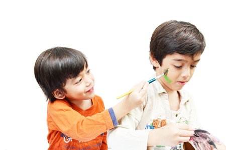 Little sibling boy painting water colorの写真素材