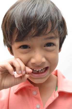 Finally first baby teeth out toothless boy smile close-up