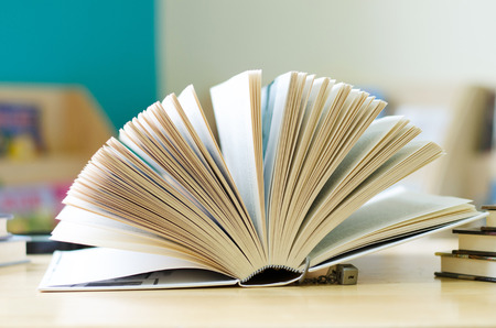  books opened on the table
