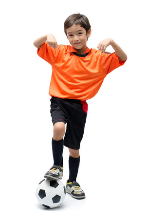 Little boy with football on white backgroundの写真素材