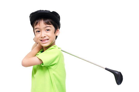 Little boy taking golf  clubの写真素材