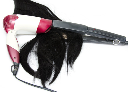 Hair with dryer on white backgroundの写真素材
