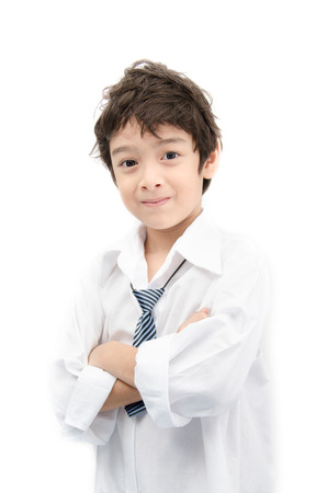 Little boy portrait white shirt on white backgroundの写真素材