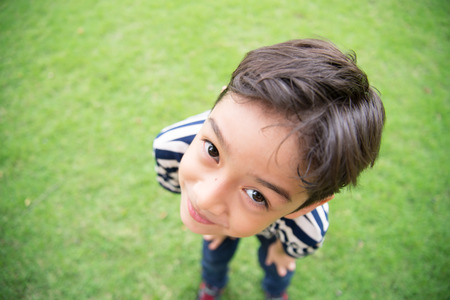 Little boy portrait at the park  happy face