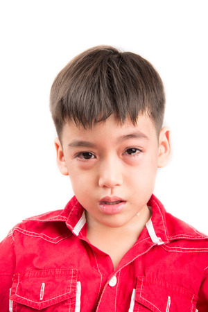 Little boy cryiing with sadnessの写真素材