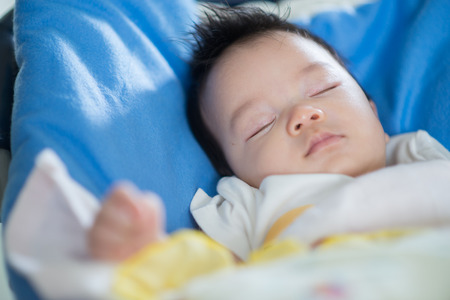 Close up portriat of Asain baby infant 2 months old eye contactの写真素材