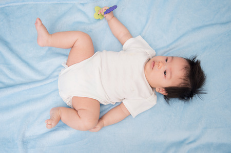 Close up portriat of Asain baby infant 2 months old eye contactの写真素材