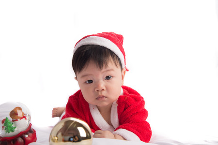Asian Infant Baby in santa costume christmas celebrationの写真素材