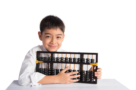 Little boy using abacus to study mathematic education class の写真素材