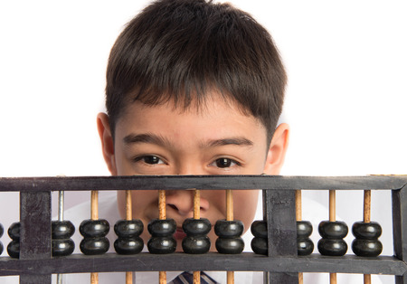 Little boy using abacus to study mathematic education class の写真素材