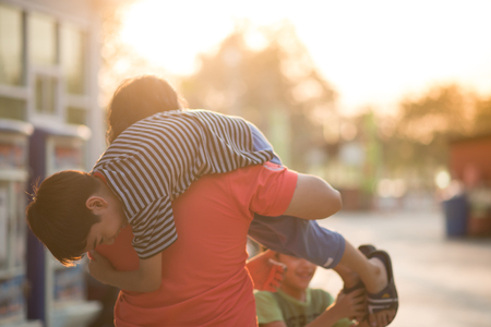 Father and son walking togetherの写真素材