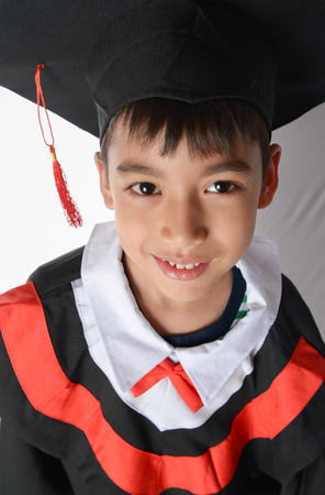Boy in Graduation Gown Bachelor Robe Cap Academic Dress Kids Cosplay Costumeの写真素材