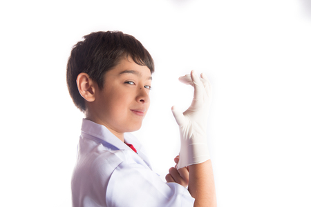 Kid wearing doctor glove for protectionの写真素材