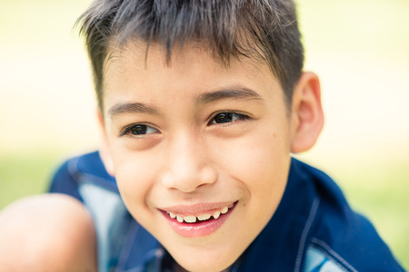 Close up face of liitle boy  Portrait photo in the park