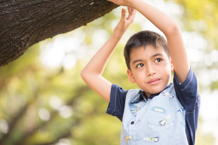 Close up face of liitle boy  Portrait photo in the parkの写真素材