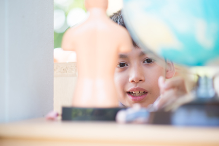 Little boy learning anatomy body model science classの写真素材