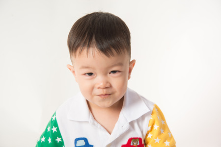 Close up of toddler Asian boy with smileの写真素材