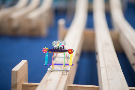 Little ASian boy create and make a wood car racingの写真素材