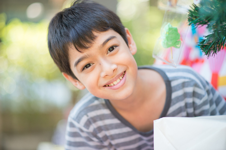 Kid celebrate Christmas and new year party with familyの写真素材