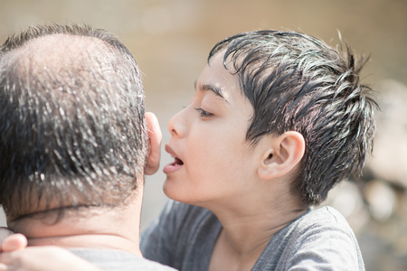 Son hug father with loveの写真素材