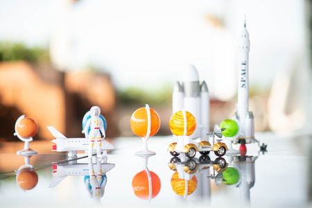 Little boy playing space ship and planet galaxy toyの写真素材