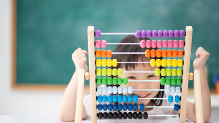 Students boy and girl leaning math in the class room Montessoriの写真素材