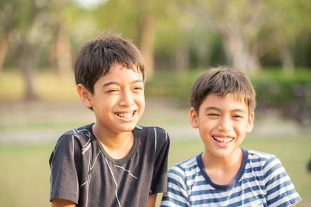 Portrait of sibling boy with happy faceの写真素材