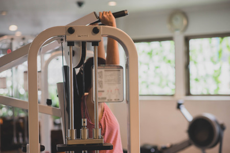 Asian woman work out exercise at Gym weight loss