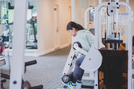 Asian woman work out exercise at Gym weight lossの写真素材