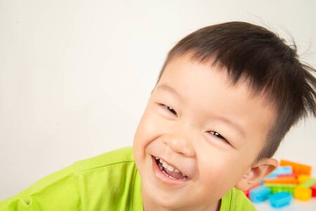 Close up Asian toddler boy smile with happy faceの写真素材