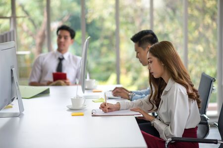 Asian business coworker people talking in the meeting room の写真素材