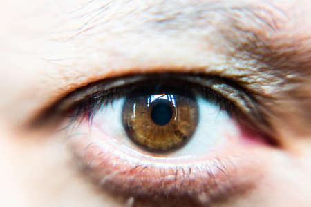 Close up macro filter of Asian man eyeの写真素材