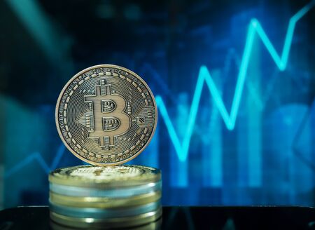 Bitcoin virtual money cryptocurrencies with graph in background, Virtual digital currency and financial investment trade concept.の写真素材