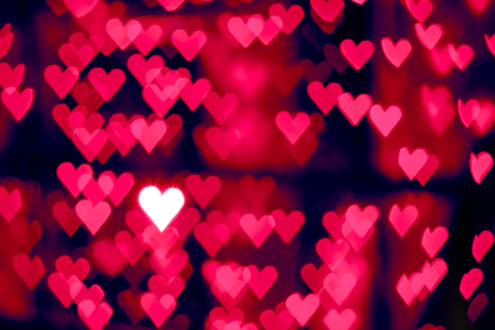 Red heart bokeh abstract backgroundの写真素材