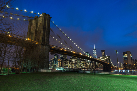 Brooklyn Bridge in Manhattan downtown with Cityscape at sunset New York USAの写真素材
