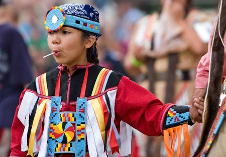 Ohsweken, Ontario, Canada, July 27, 2008. A young female Powwow Dancer in the casual entrance dance during the Grand River "Champion of Champions" Powwow.のeditorial素材