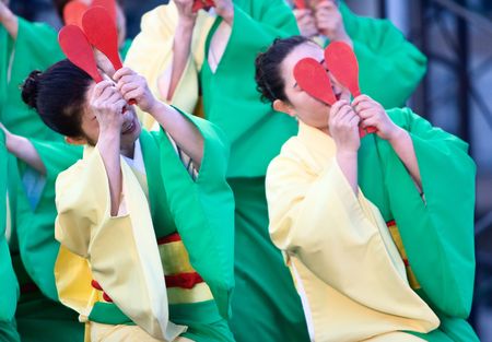 Kagoshima City, Japan, April 26, 2008. Dancers in green and yellow yukata kimono performing in the Daihanya Festival held in Kagoshima City, Japan.のeditorial素材