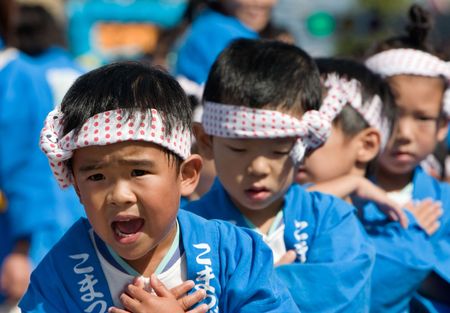 Kagoshima City, Japan, October 28, 2007. Young children in blue  hakama kimono dancing during the Taniyama Furusato  Matsuri dance festival.のeditorial素材