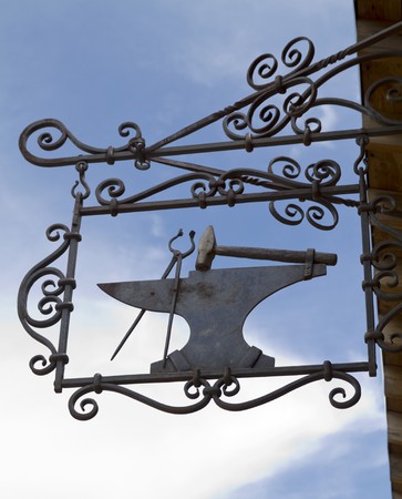 Sign indicating the location of the blacksmith shopの写真素材