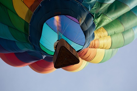 Hot air ballon gets directed, in flight, over the countrysideのeditorial素材