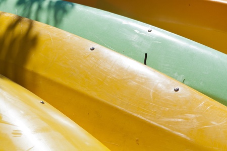Kayaks for rent sit idle at a rental business in Floridaの写真素材